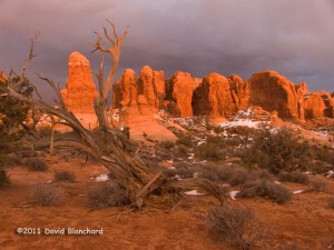 The Windows area of Arches National Park at sunset during the winter.