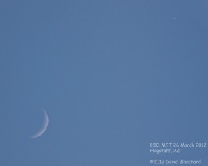 The Moon and planet Venus as seen in the middle of the afternoon.
