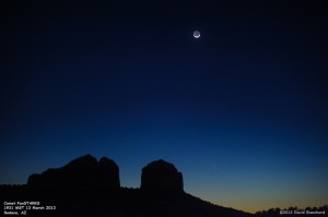 Comet PanSTARRS and crescent moon above the silhouette of Cathedral Rock.