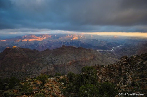 Sunrise and low clouds over the Grand Canyon.