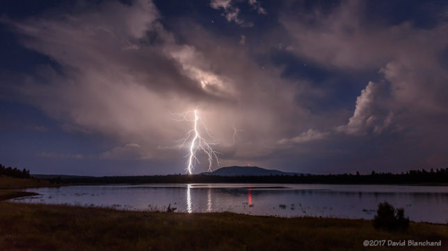 Lightning near Mormon Mt. and reflected in Lake Mary.