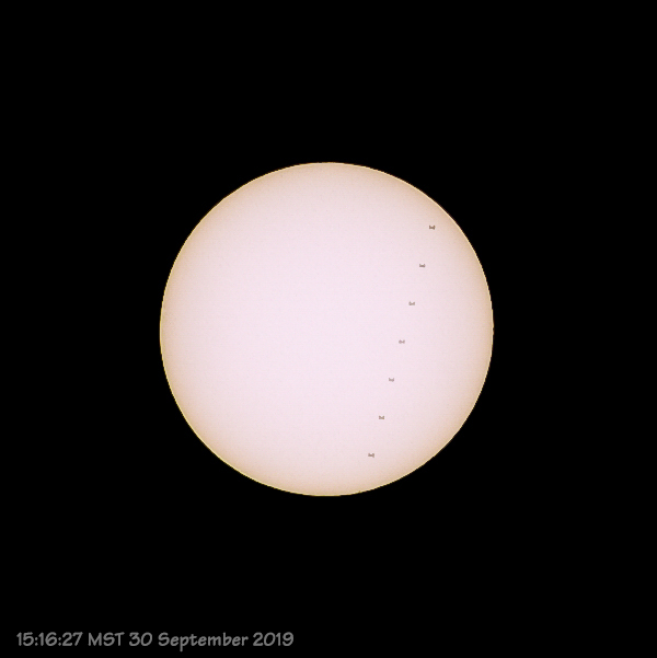 ISS passes in front of the Sun.