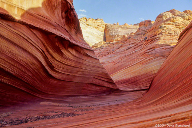 Clouds drift away and the sun returns in late afternoon at Coyote Buttes.