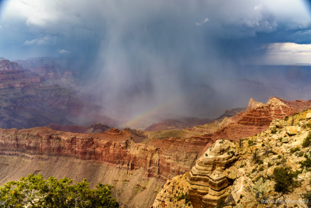 Small rainbow segment over Unkar Delta in Grand Canyon.