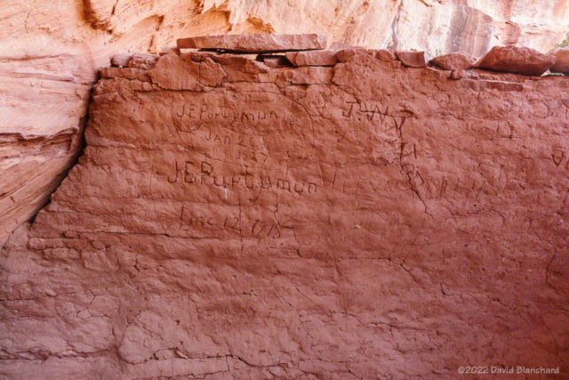 Century-old signatures on cliff dwellings.
