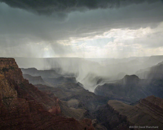 Rain falling into Grand Canyon.