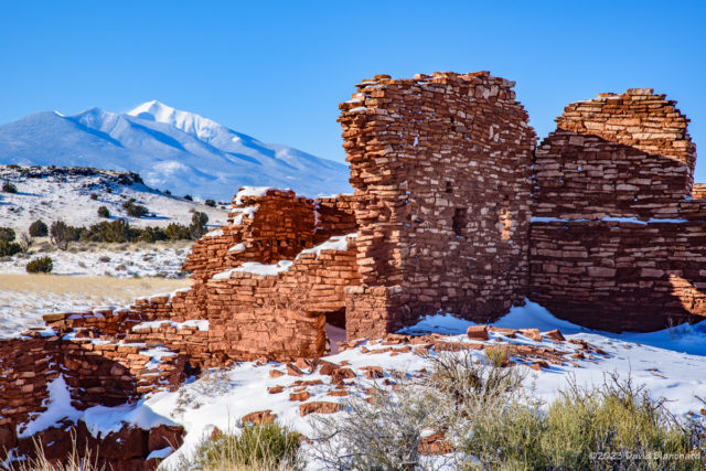 Lomaki Pueblo in Wupatki National Monument with the San Francisco Peaks in the distance.