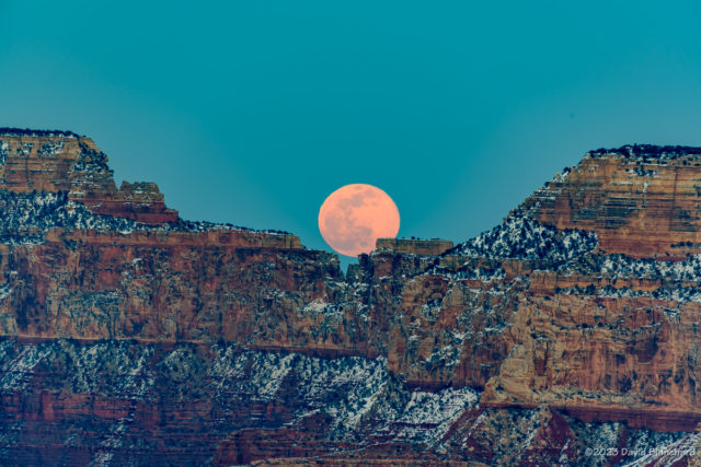 The full Moon rises between Cape Royal on the North Rim and Wotans Throne in Grand Canyon.