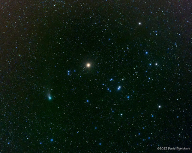Comet C/2022 E3 (ZTF) with the Hyades star cluster and the red star Aldebaran (15 February 2023).