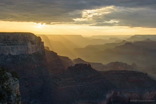 Beams of light and shadow filter deep into Grand Canyon.