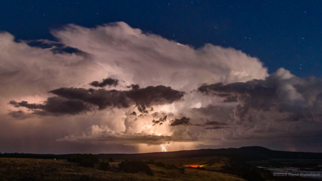 Thunderstorm with lightning and stars.